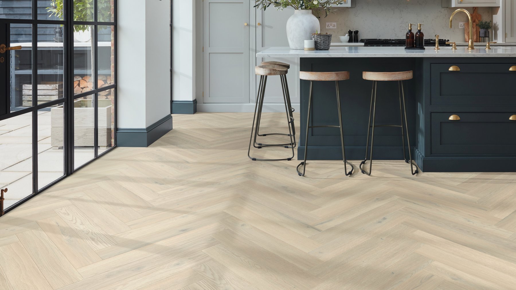 Basque Oak small herringbone floors in a bright kitchen