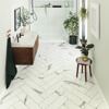 Brunella Marble SM-RKT3013-G as a herringbone in a bathroom