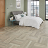 Pale green loft bedroom with Glacier Oak SM-RL21 floors in a parquet layout