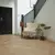 Van Gogh Canadian Urban Oak mid brown LVT flooring laid in a hallway