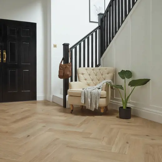 Van Gogh Canadian Urban Oak mid brown LVT flooring laid in a hallway