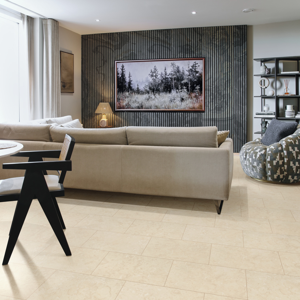 Natural Limestone light stone LVT flooring laid in an open plan area