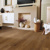 Russet character oak mid brown lvt flooring laid in a living room